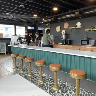 a bar with stools