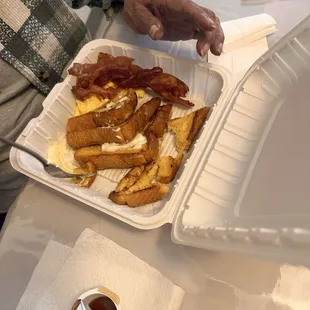 French toast with scrambled eggs and bacon