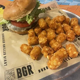Bison burger with super crispy tater tots.