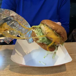 Chicken cheese with lettuce, garlic aioli on brioche.  Delicious.