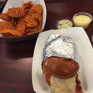 Ghost chicken sandwich and sweet potato waffle fries. The homemade poppyseed honey mustard sauce is awesome with the fries.
