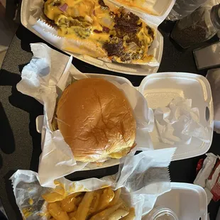 Chili cheese dog, classic single burger, fries with grilled onions and cheese