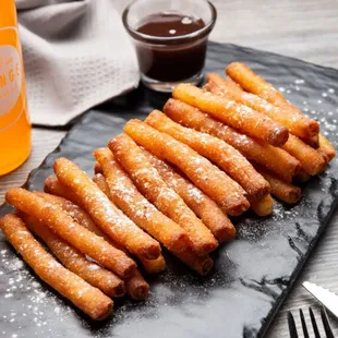Now serving fried desserts Mini Churro Bites and Funnel Cake Fries