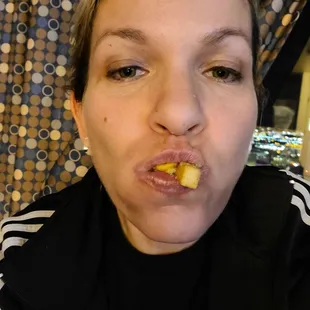 Attacking the fries like a velociraptor