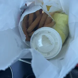 a paper bag filled with food