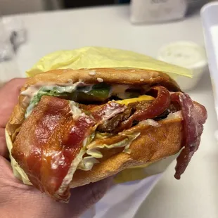 Half of the avocado, bacon burger