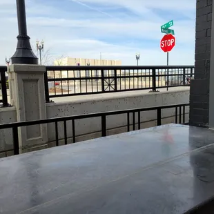 View looking out the garage door towards Burlington Station across the bridge