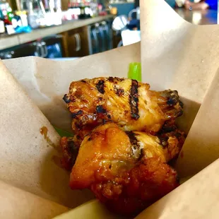 Happy hour wings, TBL sauce.