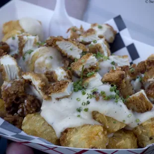 Tater tots with fried chicken and gravy....Godlike!