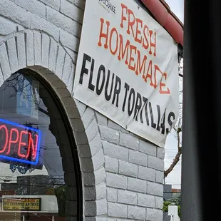 a sign for fresh homemade flour tortillas