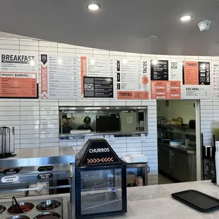 a counter with a variety of food items