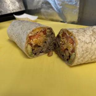 two burritos cut in half