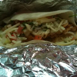 Fish Taco w/Caribbean Sauce, comes in baskets of 3. Simple food done well.