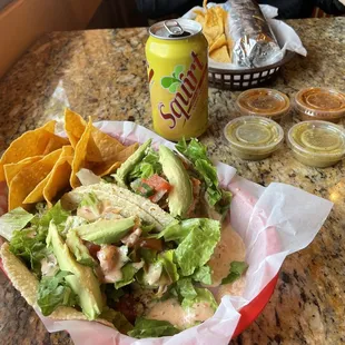 Fish tacos, honey chicken burrito, squirt