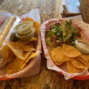 Shredded chicken burrito and spicy pork taco