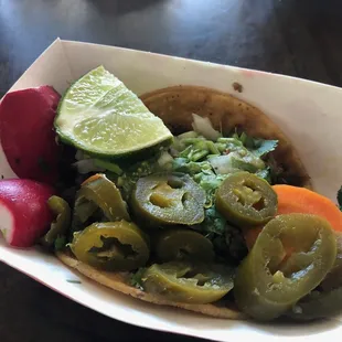 The taco is in there somewhere!  They really give you lots of extras - and plenty of meat.