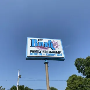 a sign for the bush family restaurant