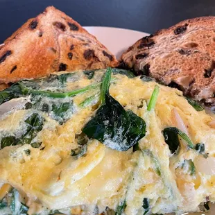 Delicious Veggie Omelette with Raisin Toast.