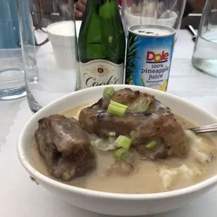 Ox Tails and Grits with a mimosa