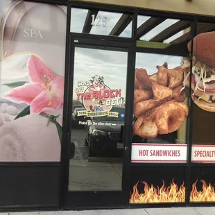 a woman eating a hot dog