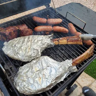 sausages and hot dogs on the grill