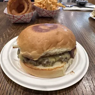 Single with cheese, onion rings, fries