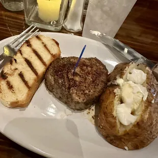 8oz filet with Bar-b-que bread and baked potato.