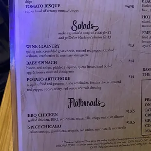 Menu. Salad lists dressing... but they actually charge you extra