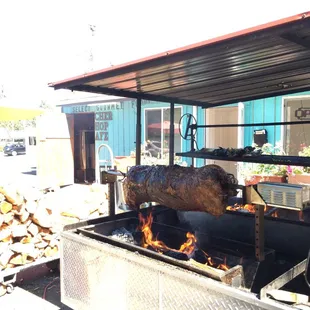 Lamb rotisserie in photo. authentic butcher shop. Amazing beef brisket sandwich, purple potato salad, baked beans.  Lunch special. Samples.