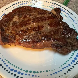 Ribeye was 1.18#. Smoked with pecan at 250f to 115f (internal) then 1-minute sear per side at about 650f. Rested 10 minutes.
