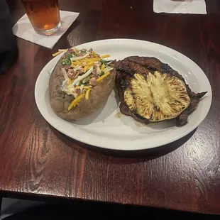 Hawaiian steak with loaded potatoe