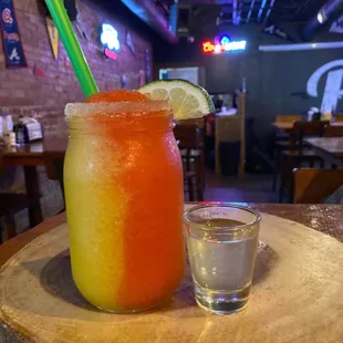 a drink and a shot of tequila