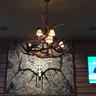 a chandelier with antlers on it