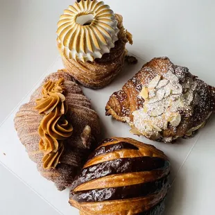 Churro croissant, key lime cruffin, twice baked almond croissant, Pain Au Chocolat