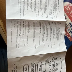 a menu and a sandwich