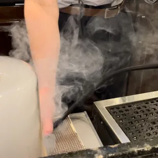 a chef preparing food in the kitchen