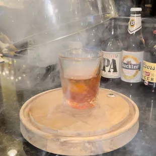 a drink being poured into a glass