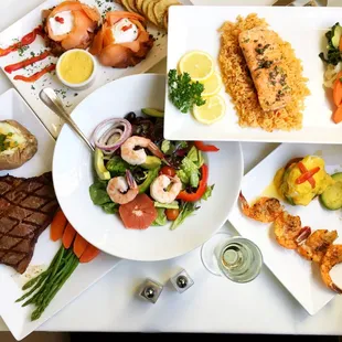 An assortment of specialty dishes at the Cafe Majestic, next to Butterfly Lounge inside the Hotel Majestic, San Francisco, CA