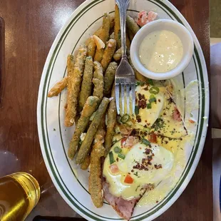 Traditional eggs Benedict and fried green beans