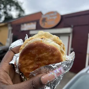 Sausage biscuit with over med egg!! Phenomenal