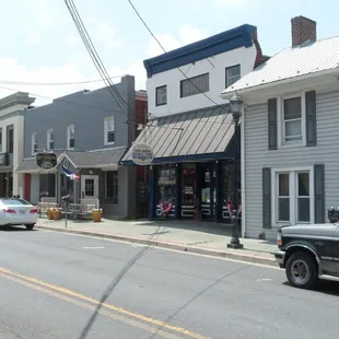 Buttersburg Inn (blue building with green sign)