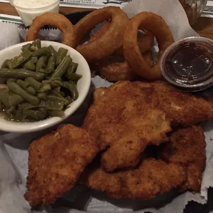 Chicken nuggets with green beans and onion rings