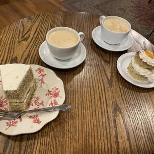 a piece of cake and two cups of coffee