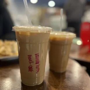 Vanilla ice latte half caf in the front