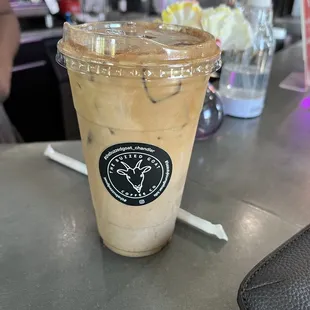 Large Iced Chai Tea Latte with Almond Milk and a shot of Espresso.