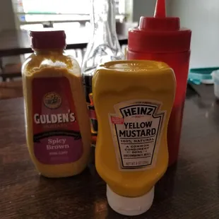 mustard and ketchup on a table