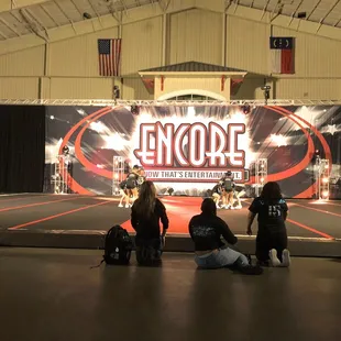 Stage not raised for viewing or for coaches to be on the side lines all the family and friends had to kneel too