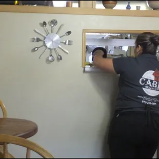 My super friendly server, Anna, reaches to the kitchen window, complete with glove - your meal arrives HOT from the kitchen - to pick up my