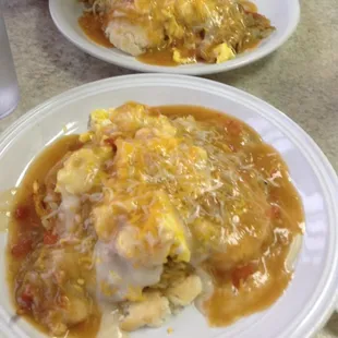 Loaded Biscuits and Gravy with pork green chili hash browns and scrambled eggs