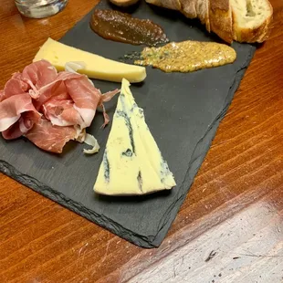 Market plate with various cheese's &amp; prosciutto